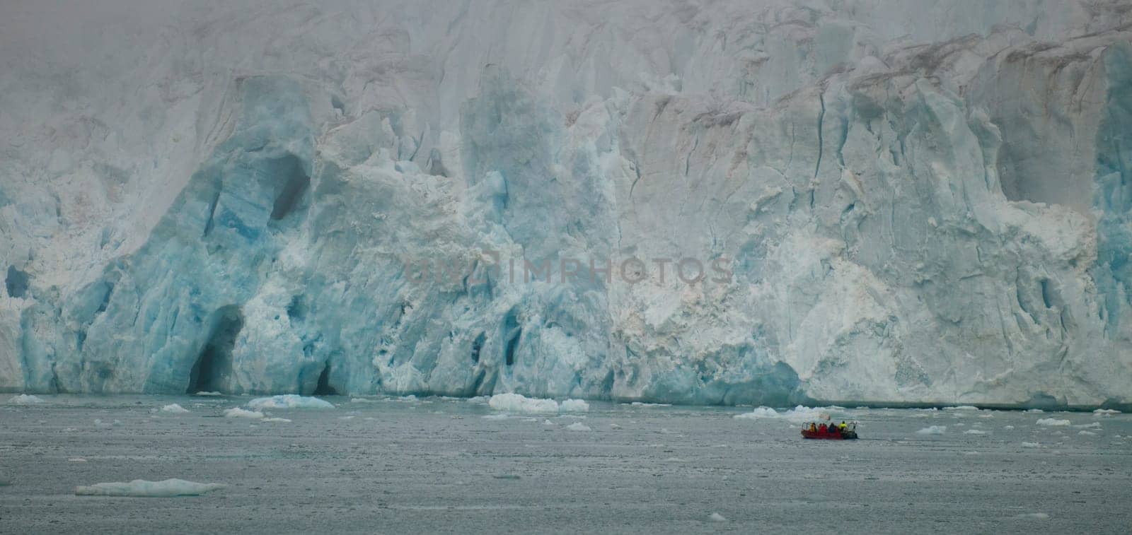 Svalbard Spitzbergen Islands Glacier view with small zodiac 