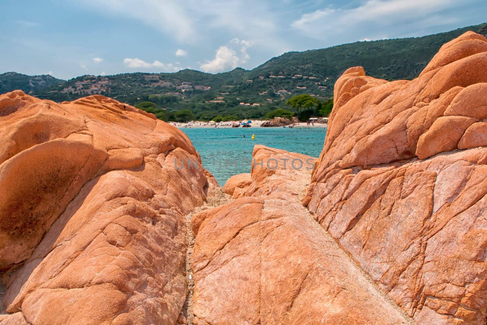 Corsica wonderful coastline turquoise sea water and red rocks