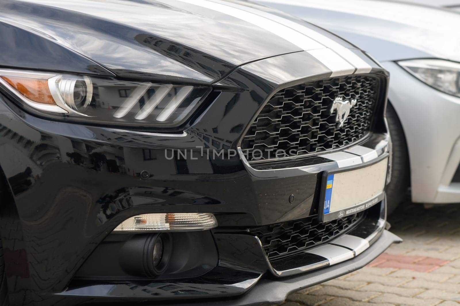 Gaziveren Cyprus 14/03/2024 - black and white Ford Mustang side view 1