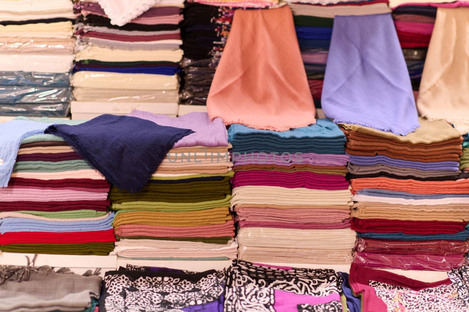 A Tapestry of Tradition: Colorful Array of Muslim Clothing for Sale on Istanbul Streets by dotshock