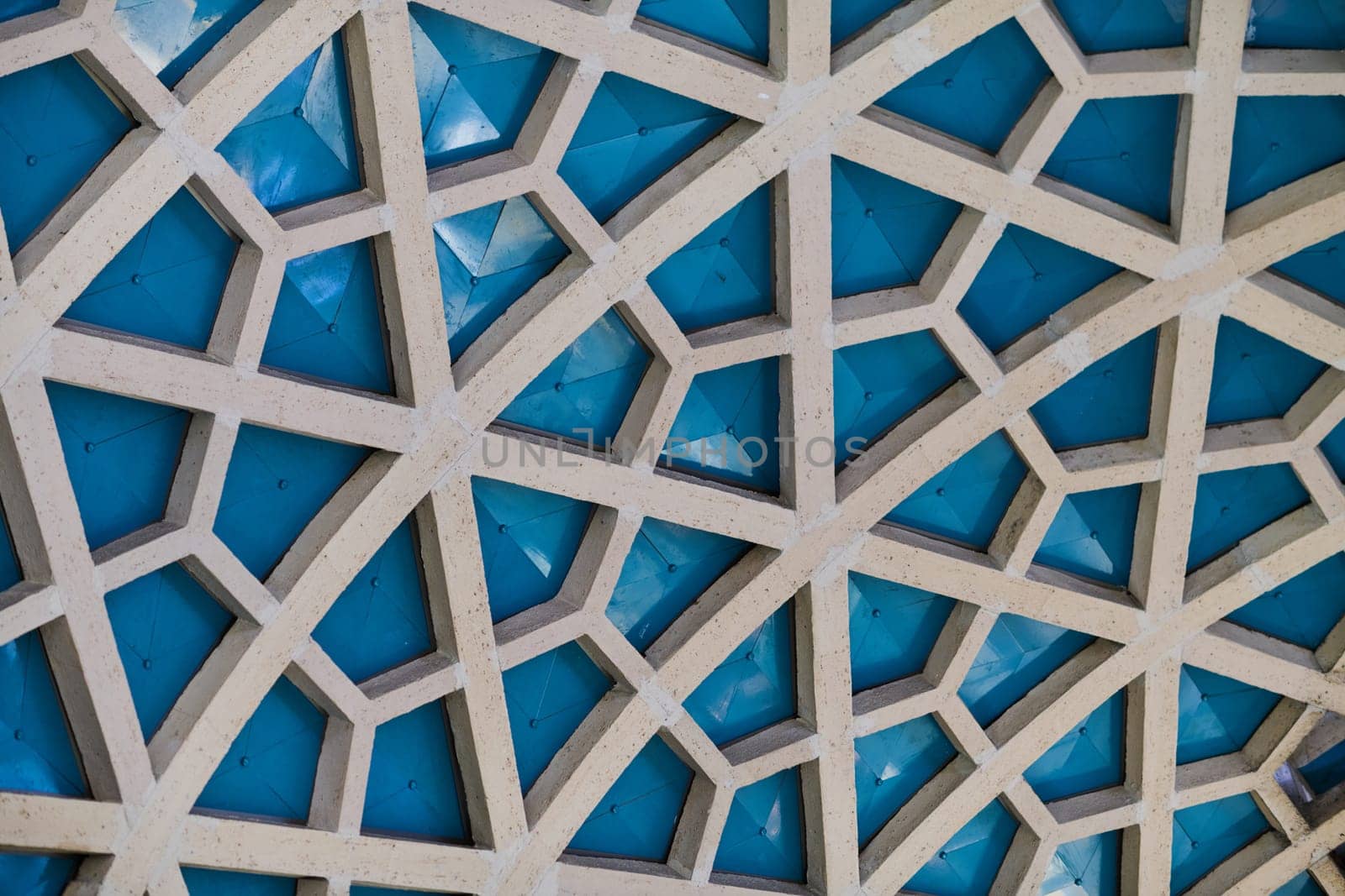 Architectural detail texture background with oriental hexagonal grid pattern by dotshock