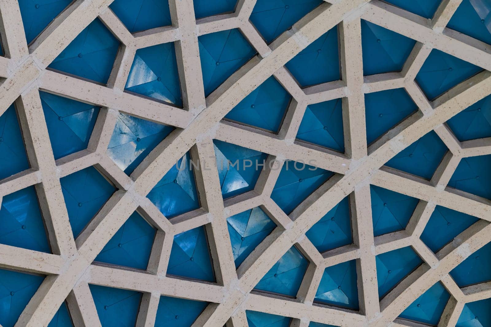 Architectural detail texture background with oriental hexagonal grid pattern by dotshock