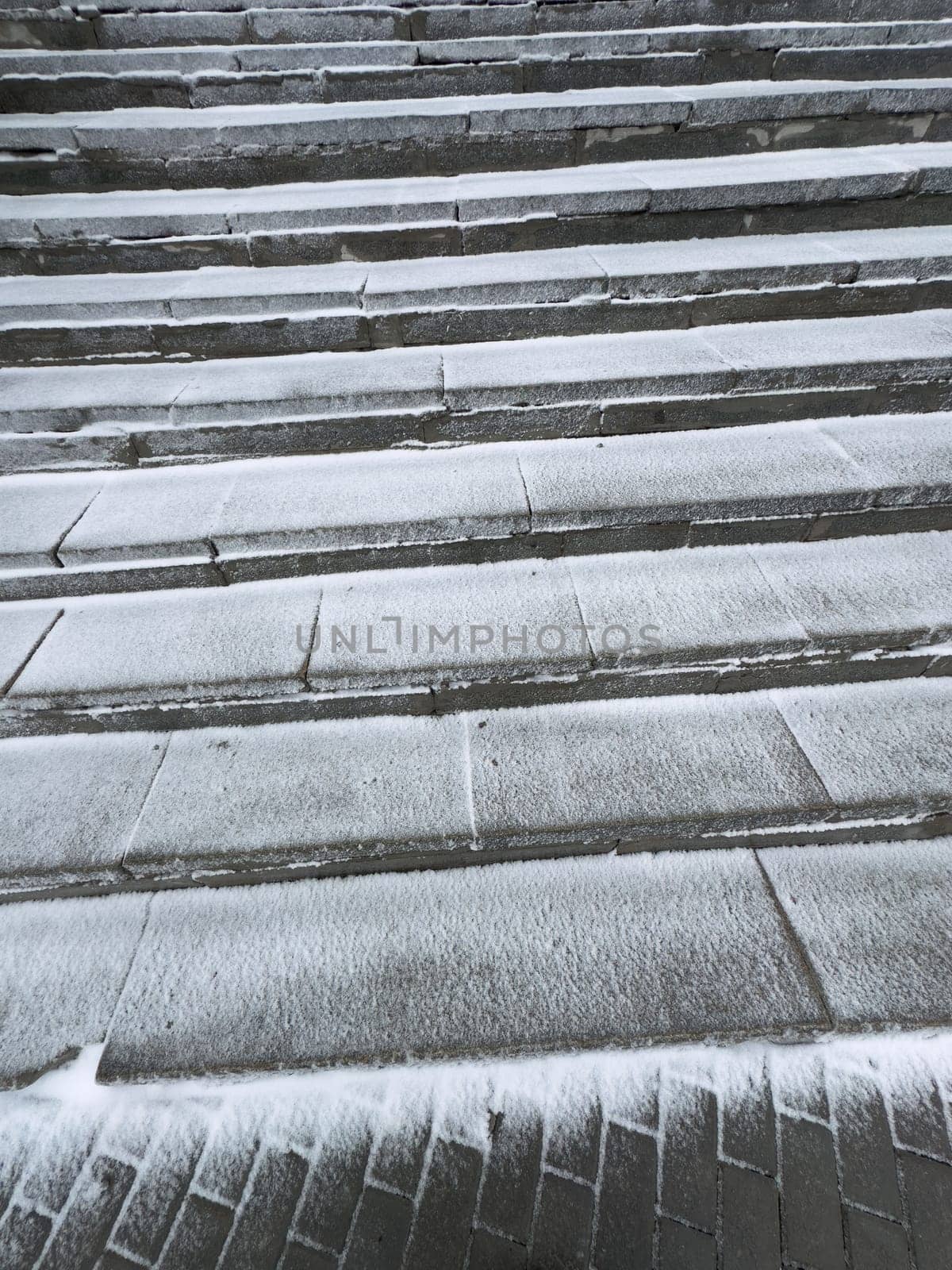 concrete steps covered with snow
