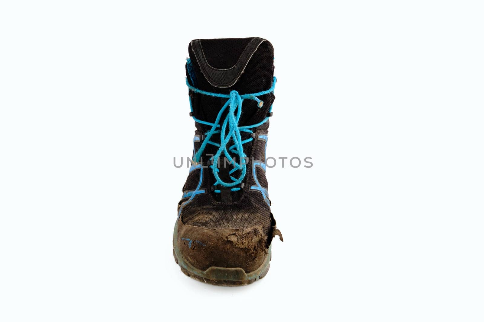 An old worn shoe top view on a white background