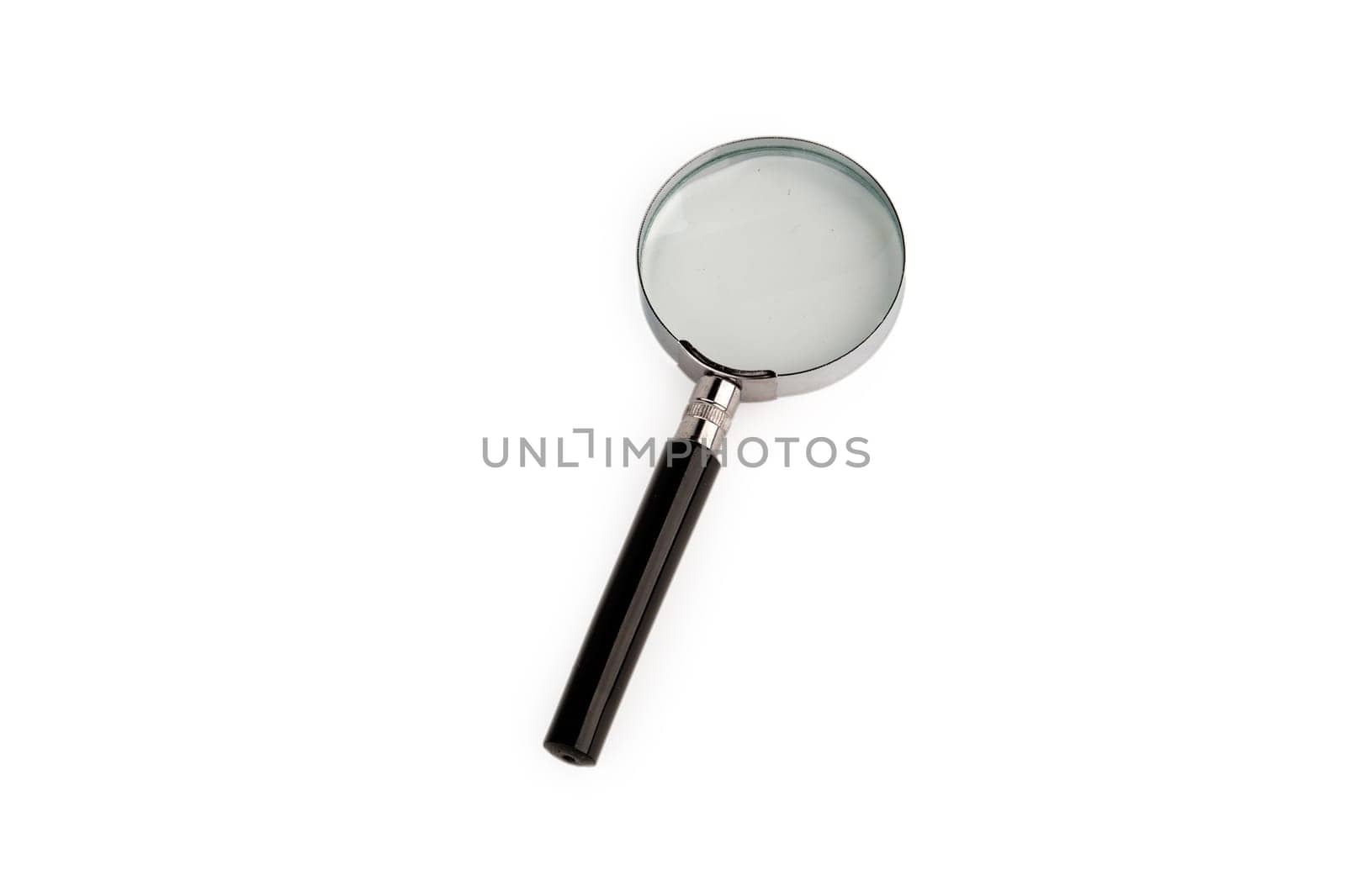 A magnifying glass with a black handle lying on a white background