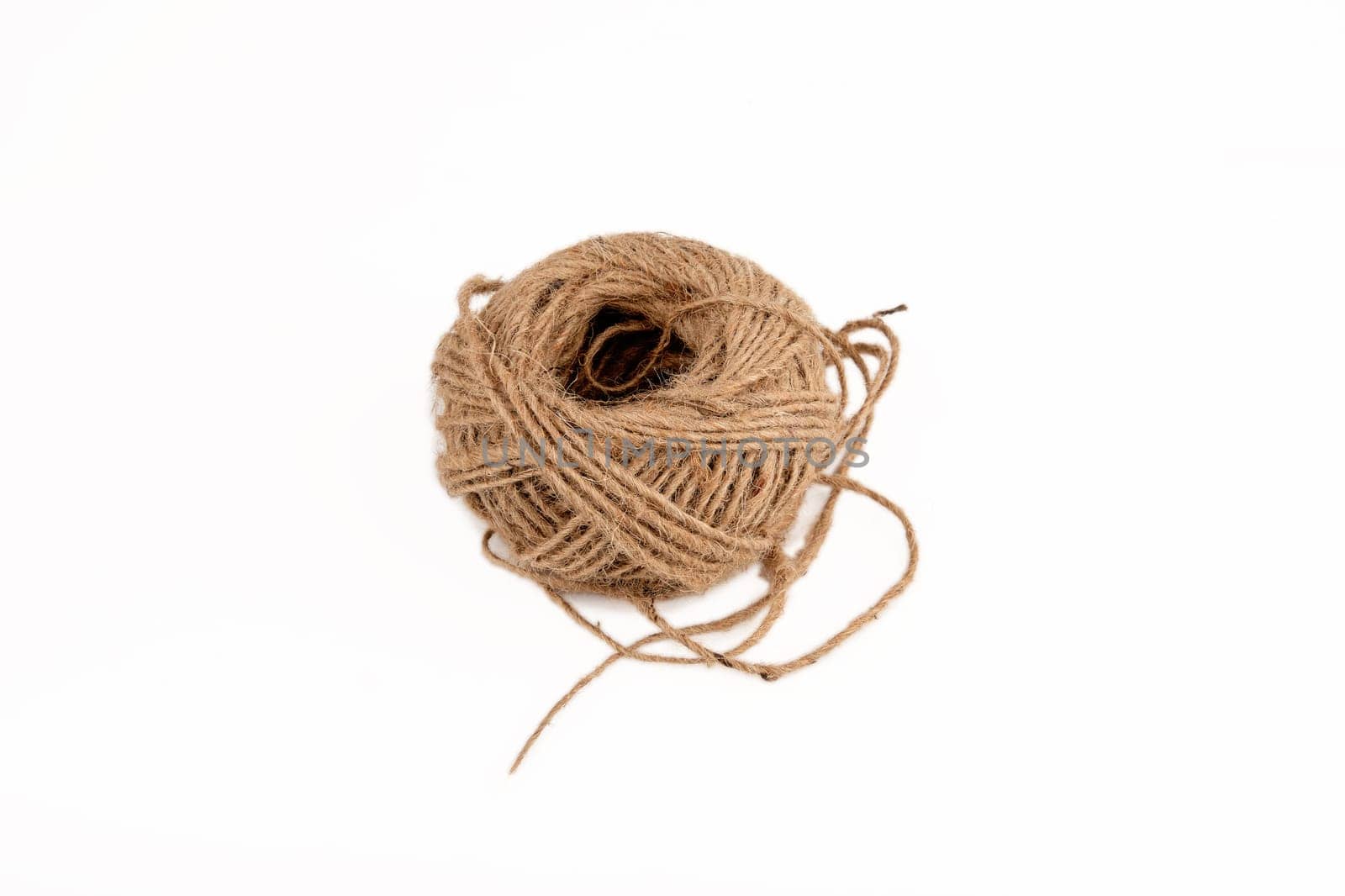 A coil of rope on a white background