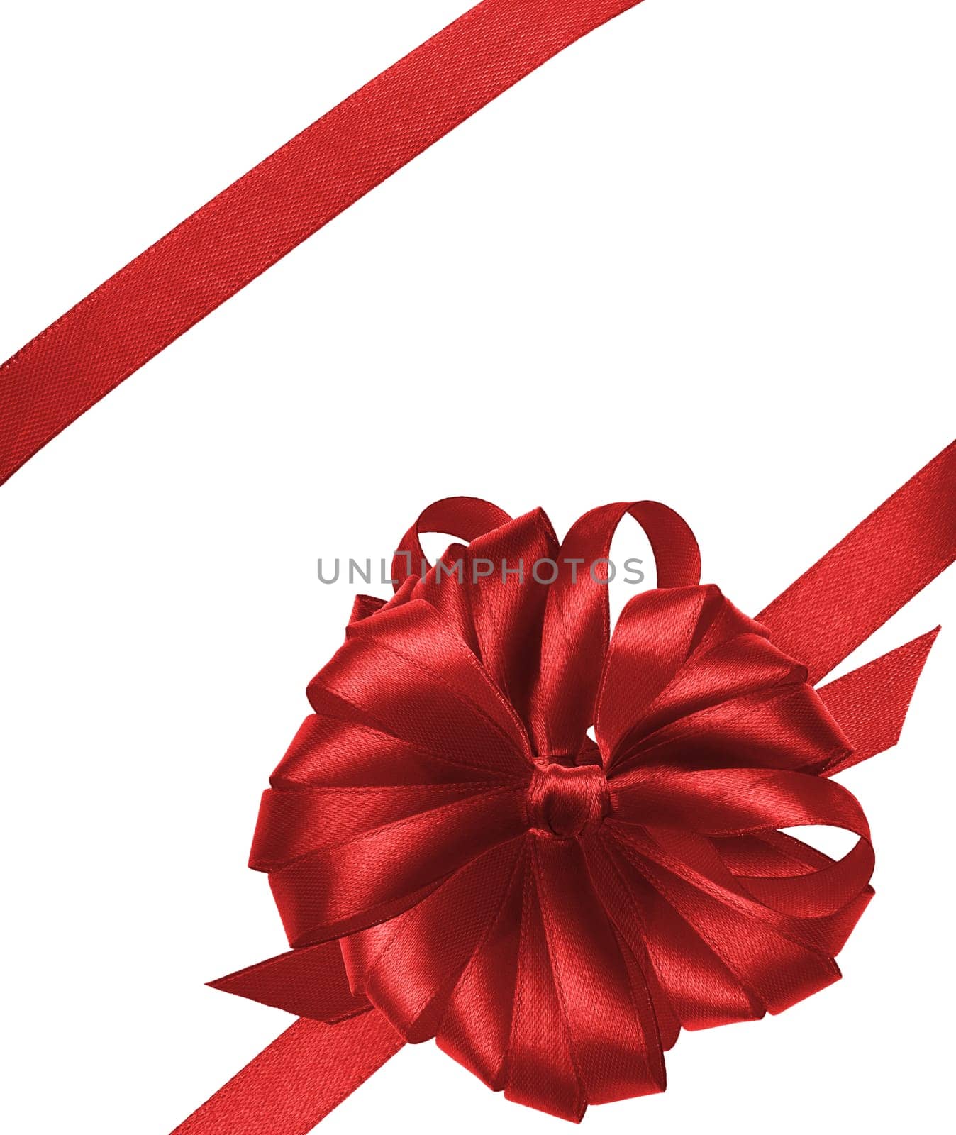 Tied bow made of red silk ribbon on an isolated background, decor for a gift by ndanko