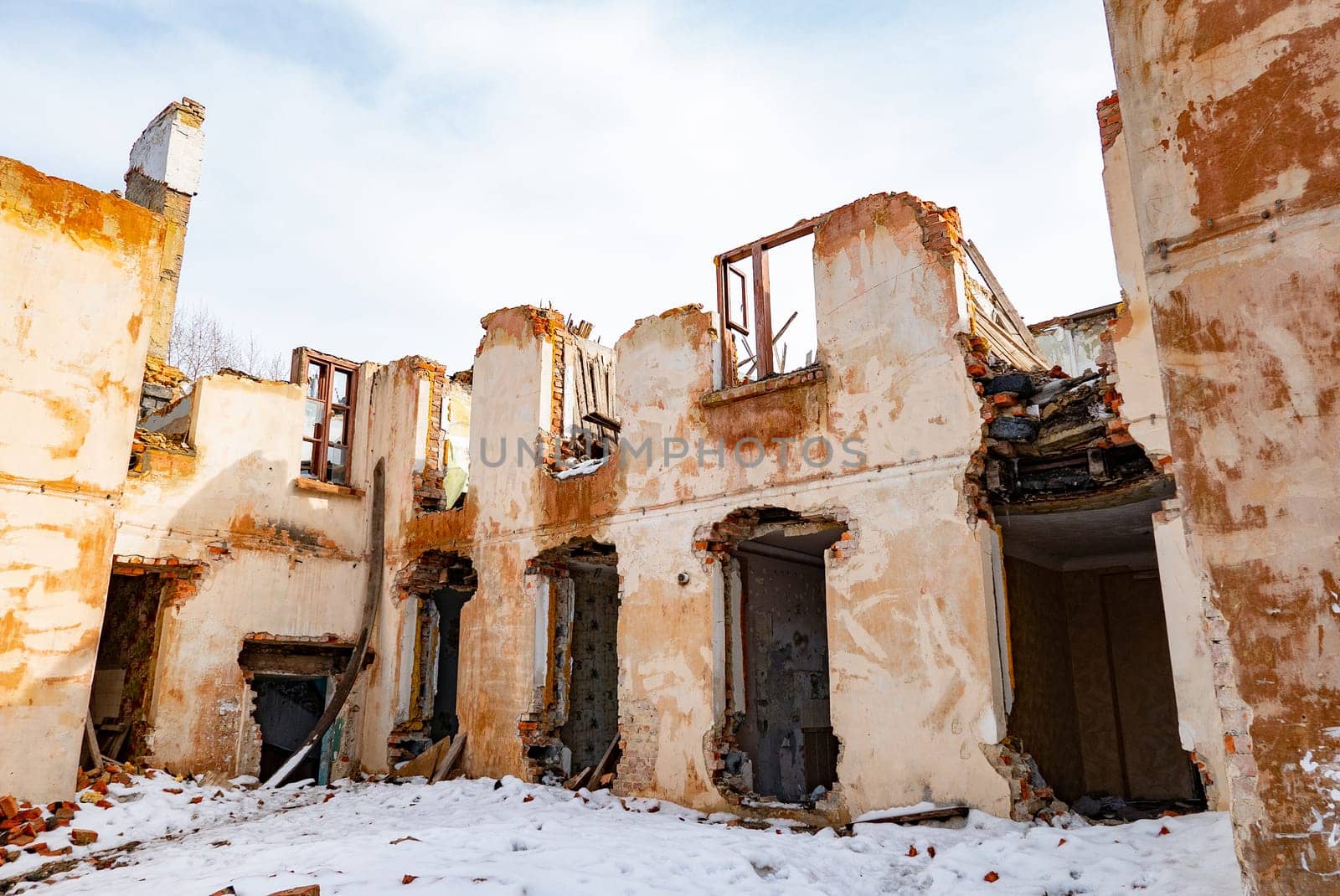 Post-war landscape. Destroyed building. War ruins. Destroyed city after the bombing. Dead city. Bombed buildings. Debris buildings. War destruction.