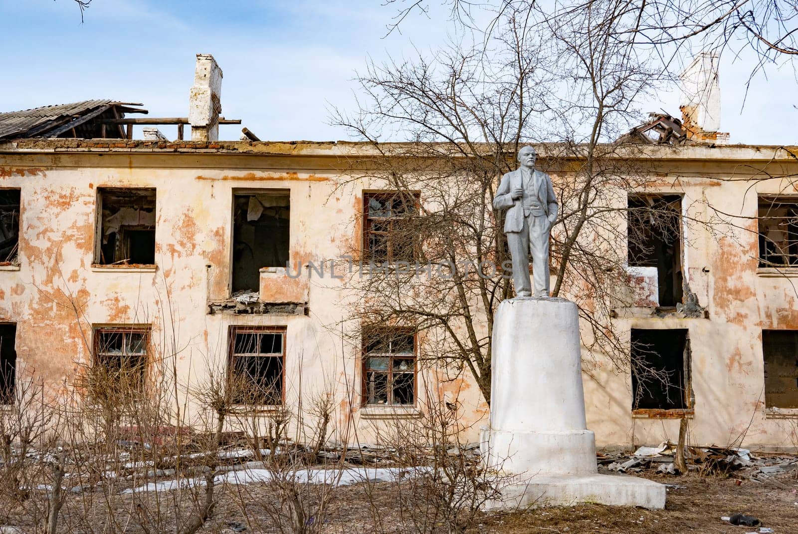 Post-war landscape. Destroyed building. War ruins. Destroyed city after the bombing. Dead city. Bombed buildings. Debris buildings. War destruction.