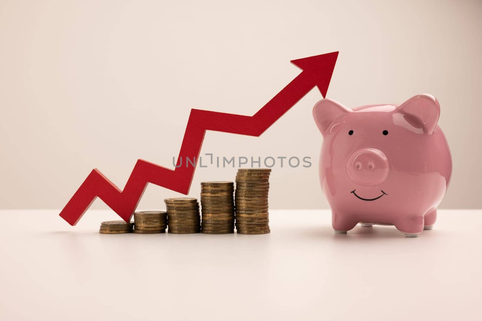 piggy bank, red up arrow and stacks of gold coins isolated on white background.