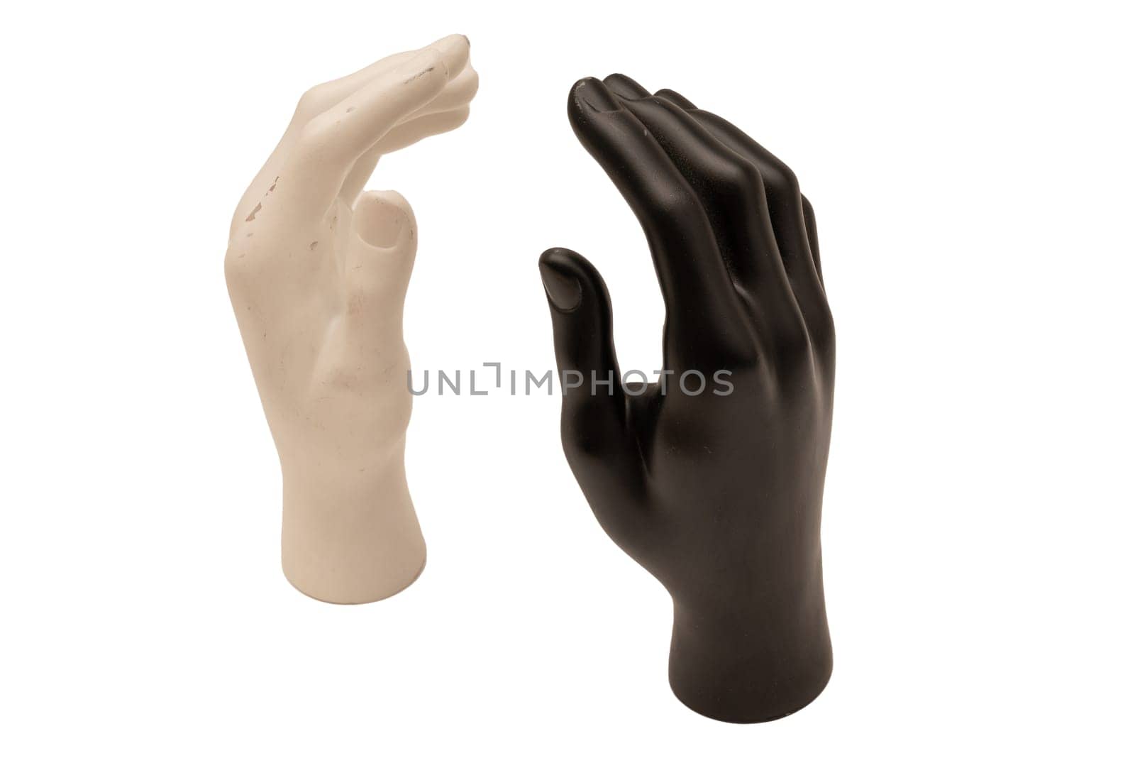 Old shabby mannequin hands on a white background