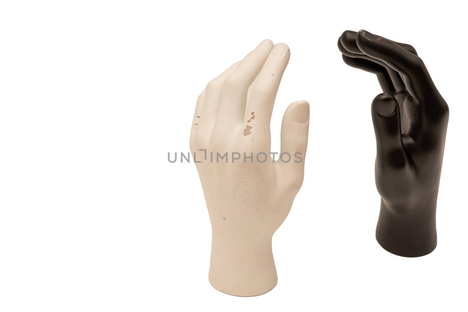 Old shabby mannequin hands on a white background by zartarn