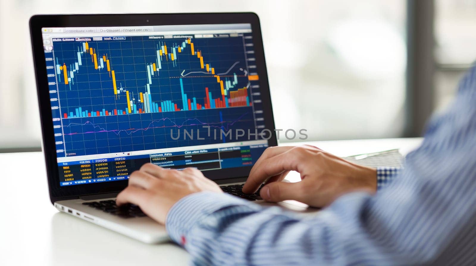 A close up photo of a young investor studying stock options on a laptop.