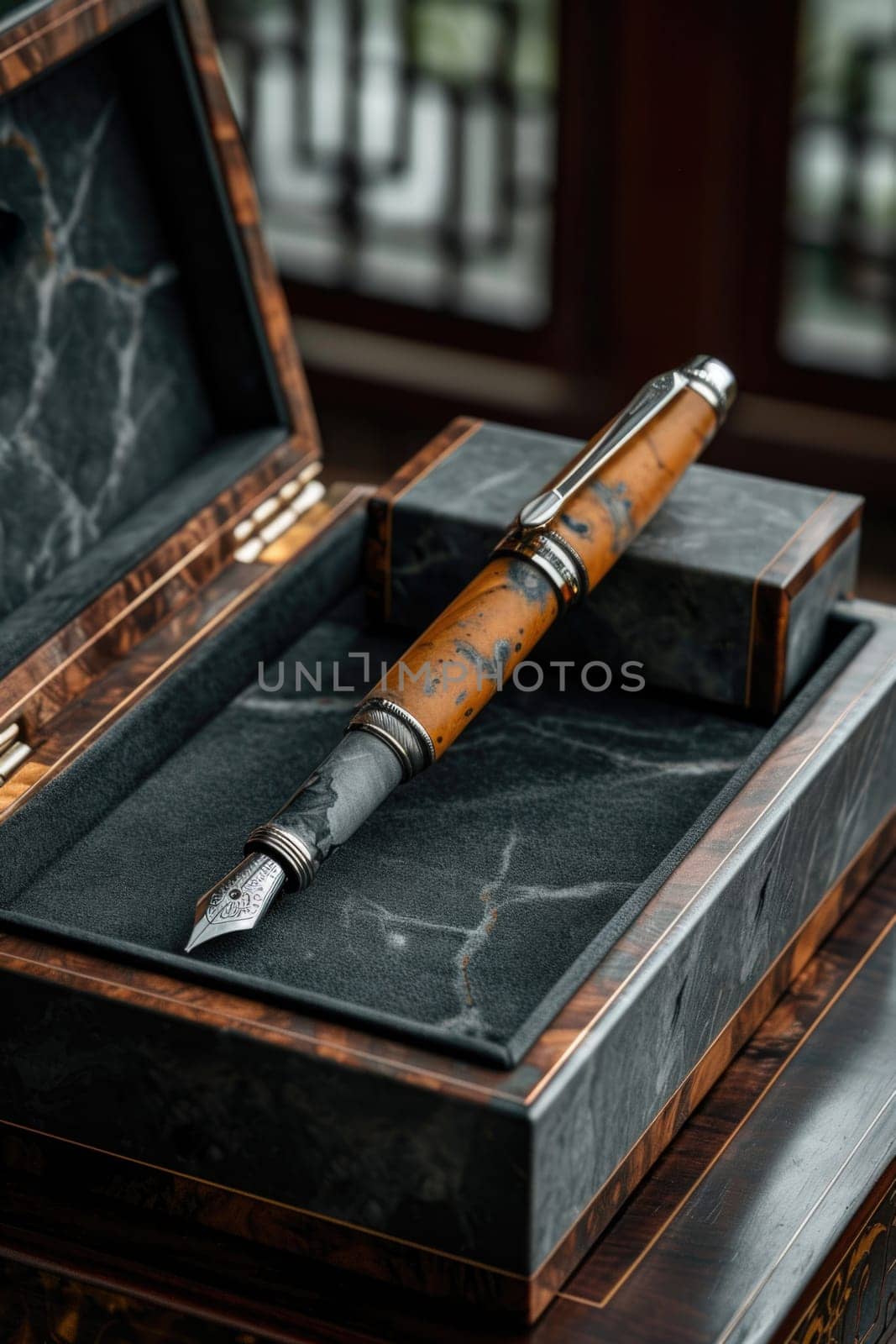 stylish fountain pen with a stylish box on the table.