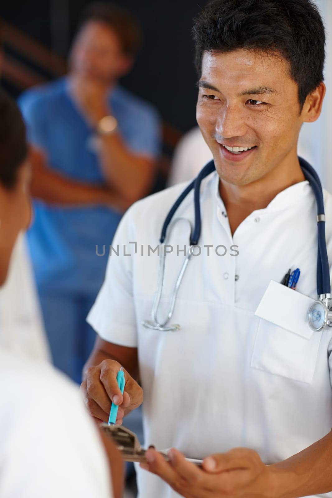 Asian doctor, communication and discussion with report, results and paperwork for health and wellness. Cardiologist, stethoscope and medical chart for healthcare, insurance and professional diagnosis.