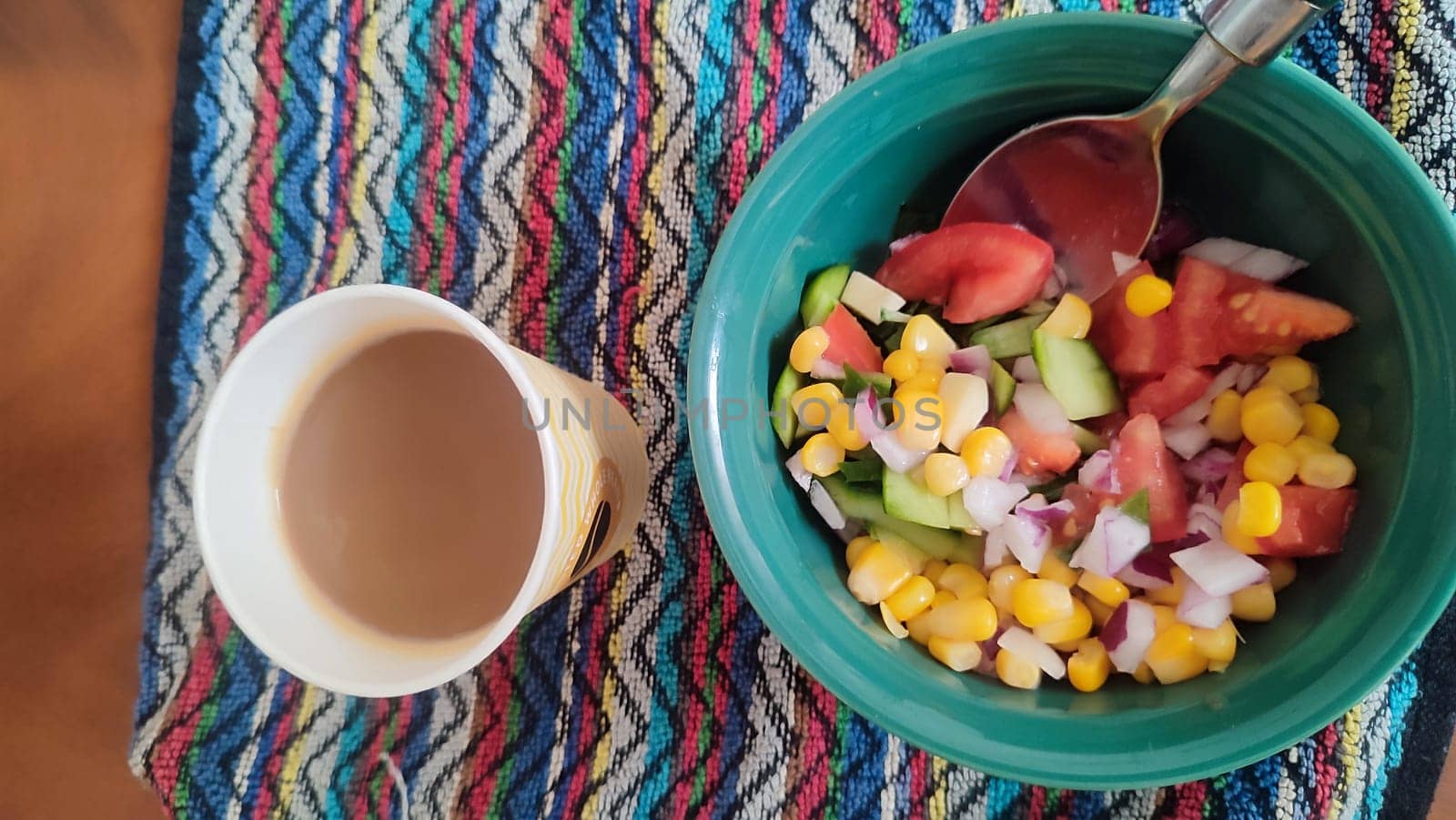 fresh vegetable salad and glass of coffee, breakfast food. High quality photo