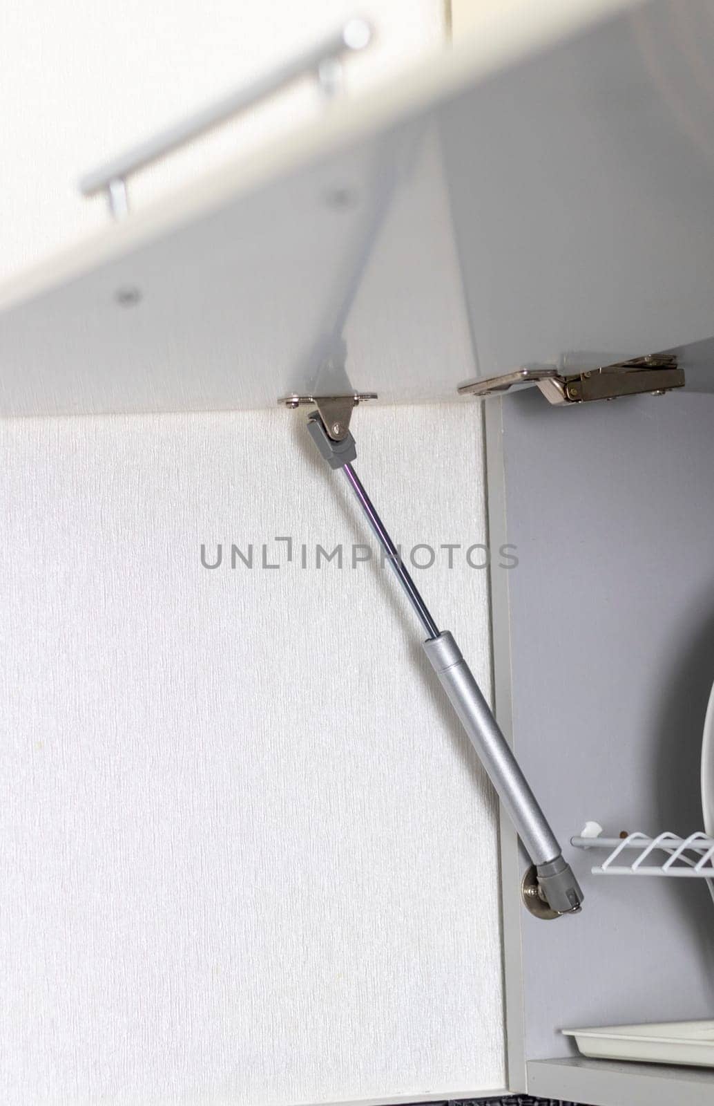 Shot of the gas strut for kitchen cabinet