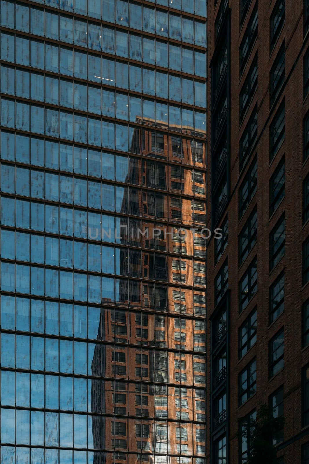 Reflection of a Traditional Building in Modern Glass Facade in NYC by apavlin