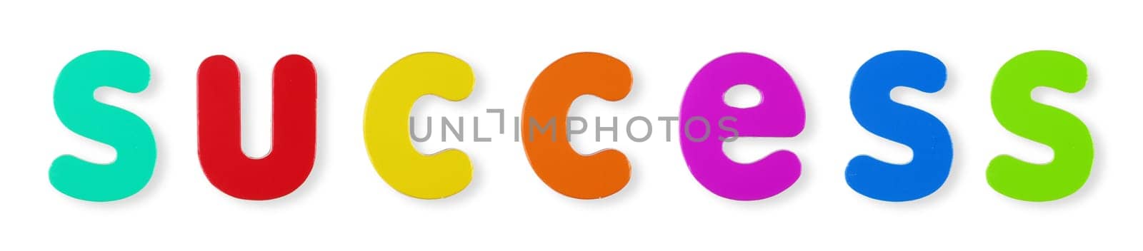 A Success word in coloured magnetic letters on white with clipping path to remove shadow