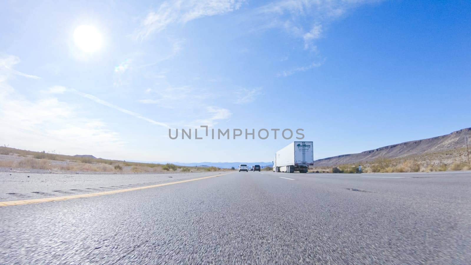 HWY 15, California, USA-December 3, 2022-Embarking on a road trip from Nevada to California, driving on Highway 15 during the day offers scenic views and an exciting journey between states.