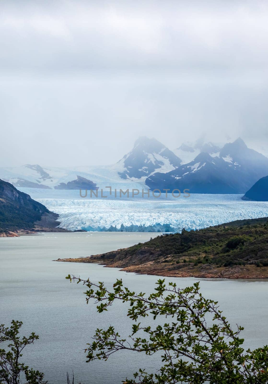 Majestic Glacier View Over the Lake with Mountain Peaks by FerradalFCG