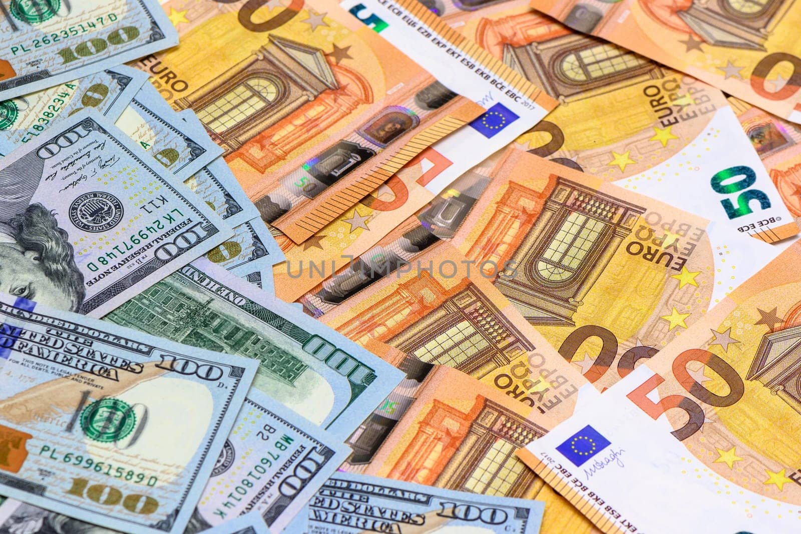 Banknotes of 100 dollars and 50 euros 2