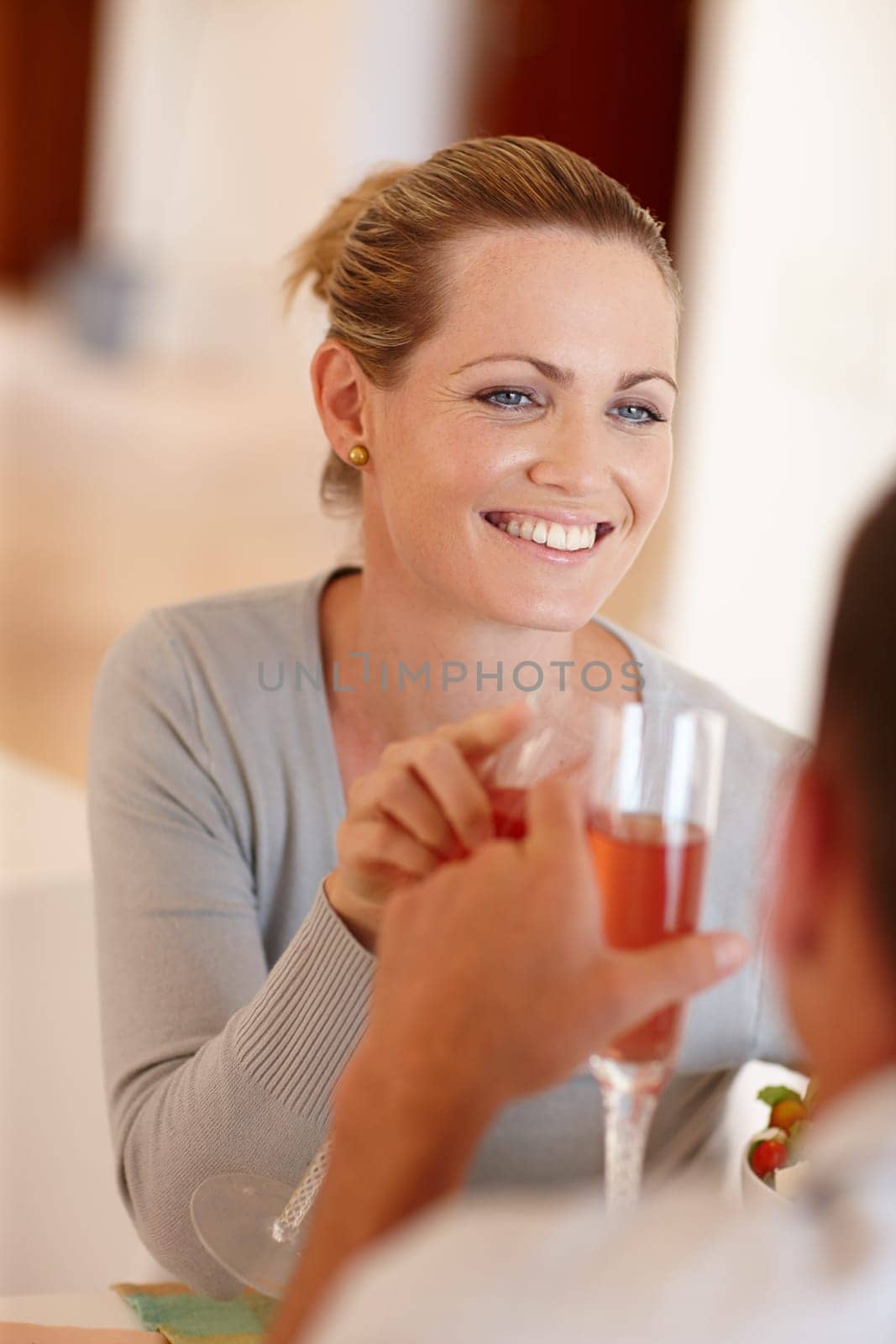 Woman, toast and couple with wine for celebration, love and smile for marriage milestone in home. Happy, glasses and cheers for relationship achievement, romance and people bonding in apartment by YuriArcurs