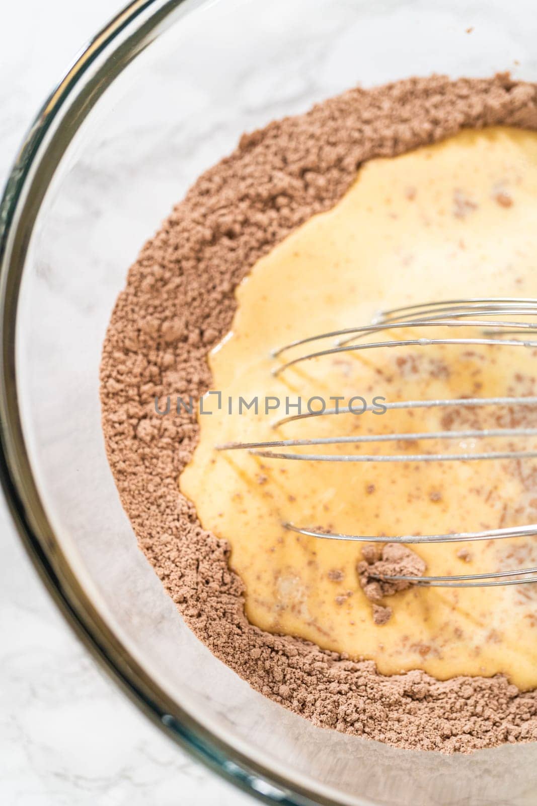 Whisking Delight - Chocolate Bundt Cake in the Making by arinahabich