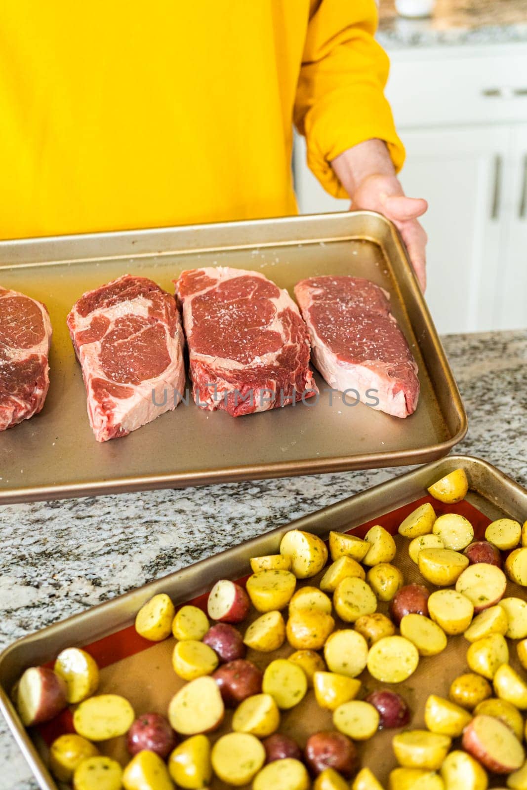 Seasoned Rib Eye Steak Ready for Grilling by arinahabich