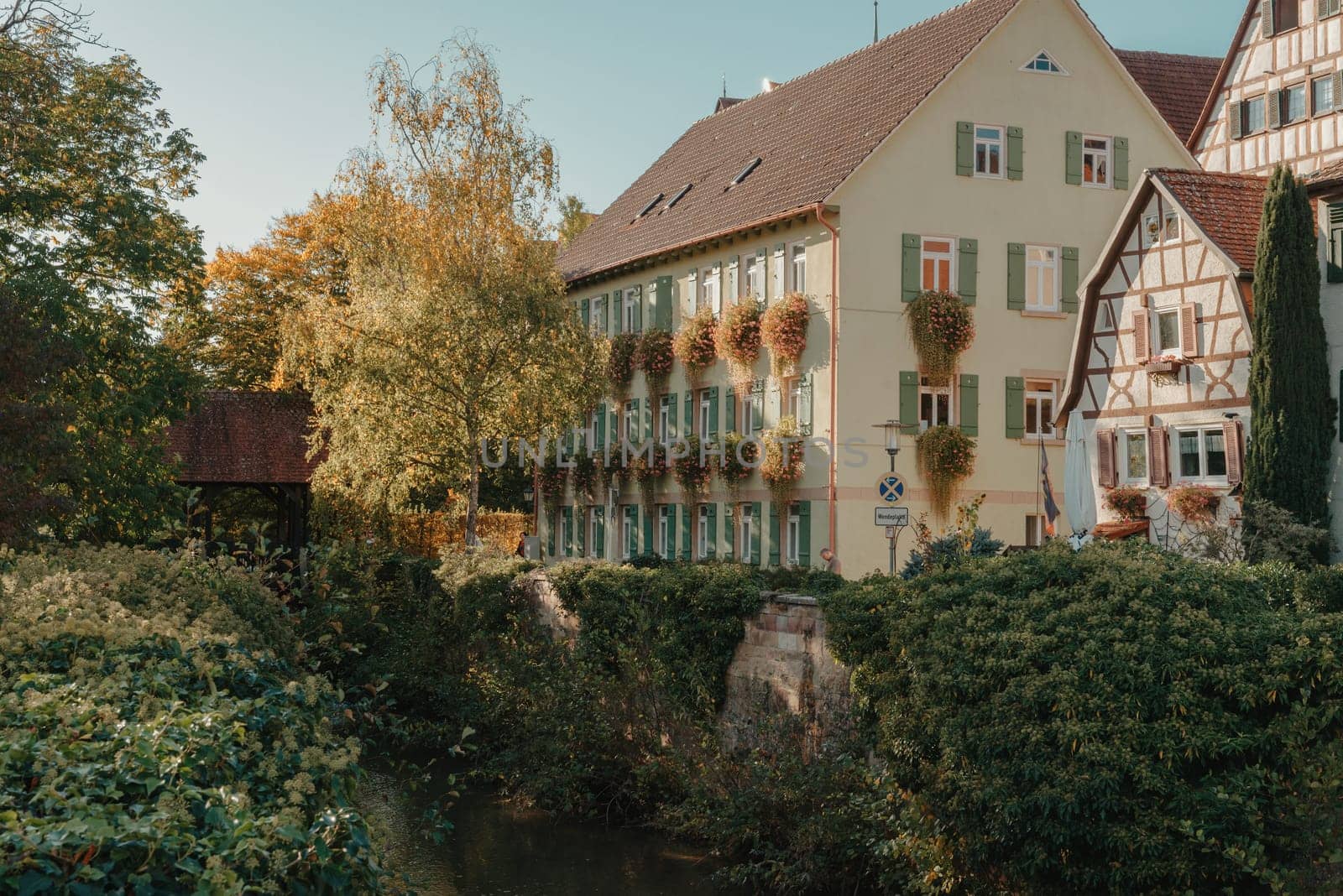 Old national German town house. Old Town is full of colorful and well preserved buildings. Baden-Wurttemberg is a state in southwest Germany bordering France and Switzerland. The Black Forest, known for its evergreen scenery and traditional villages, lies in the mountainous southwest. Stuttgart, the capital, is home to Wilhelma, a royal estate turned zoo and gardens. Porsche and Mercedes-Benz have headquarters and museums there. The 19th-century Hohenzollern Castle sits in the Swabian Alps to the south.