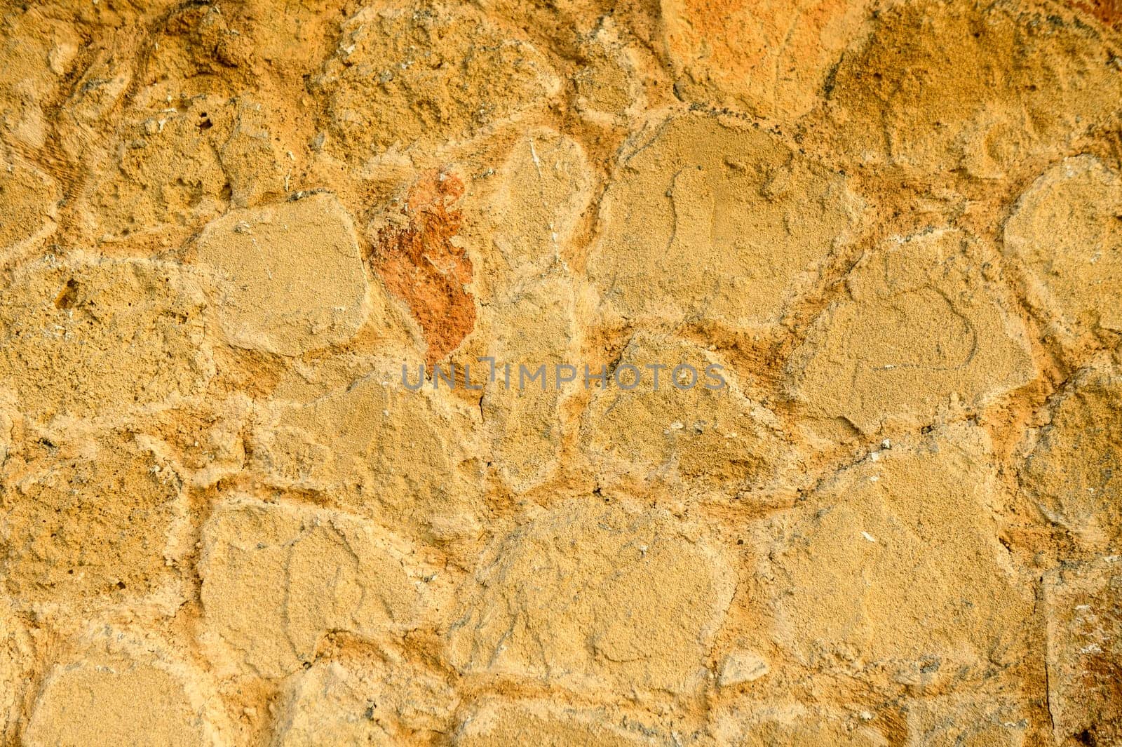 House wall made of natural stones and shell rock as background by Mixa74