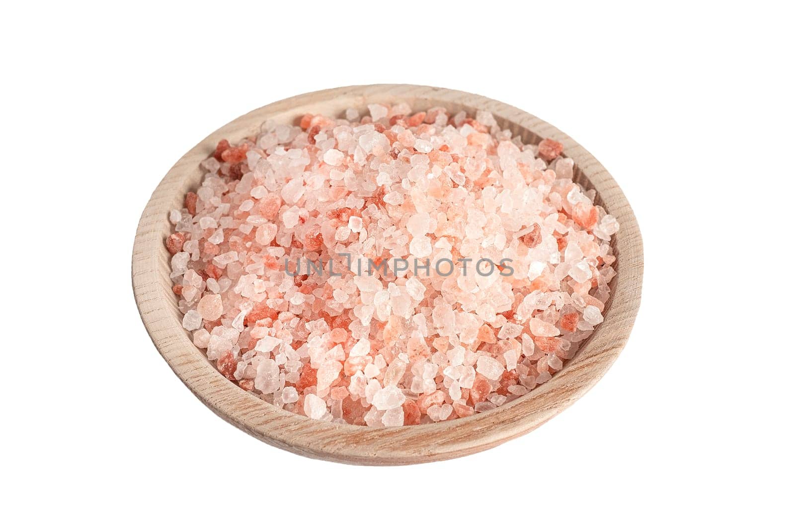 Pink Himalayan salt in wooden bowl isolated on white background. Top view