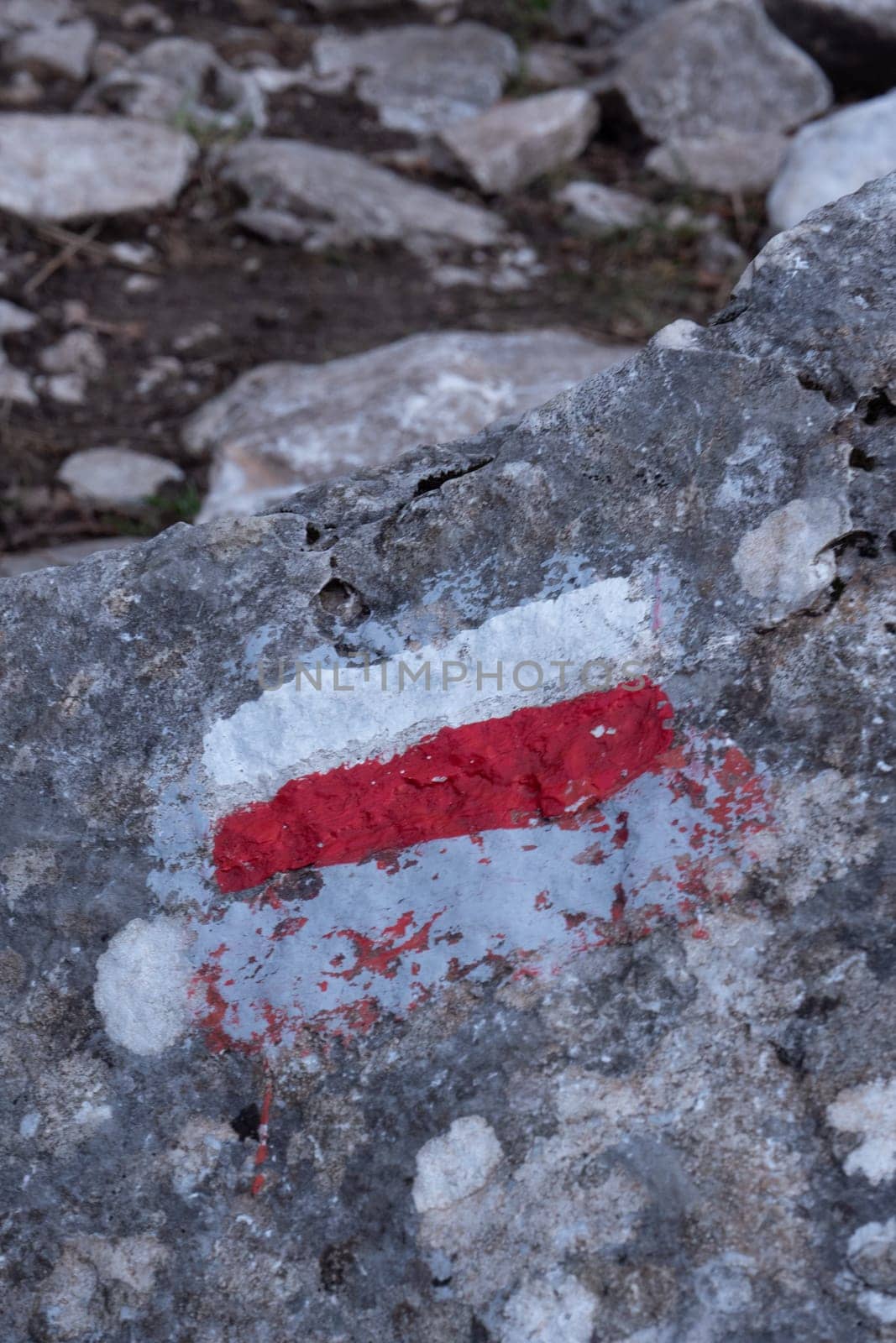 Marking of a long-distance hiking route, white and red, Itineraries in France, Marking on rock, Hiking trail by FreeProd
