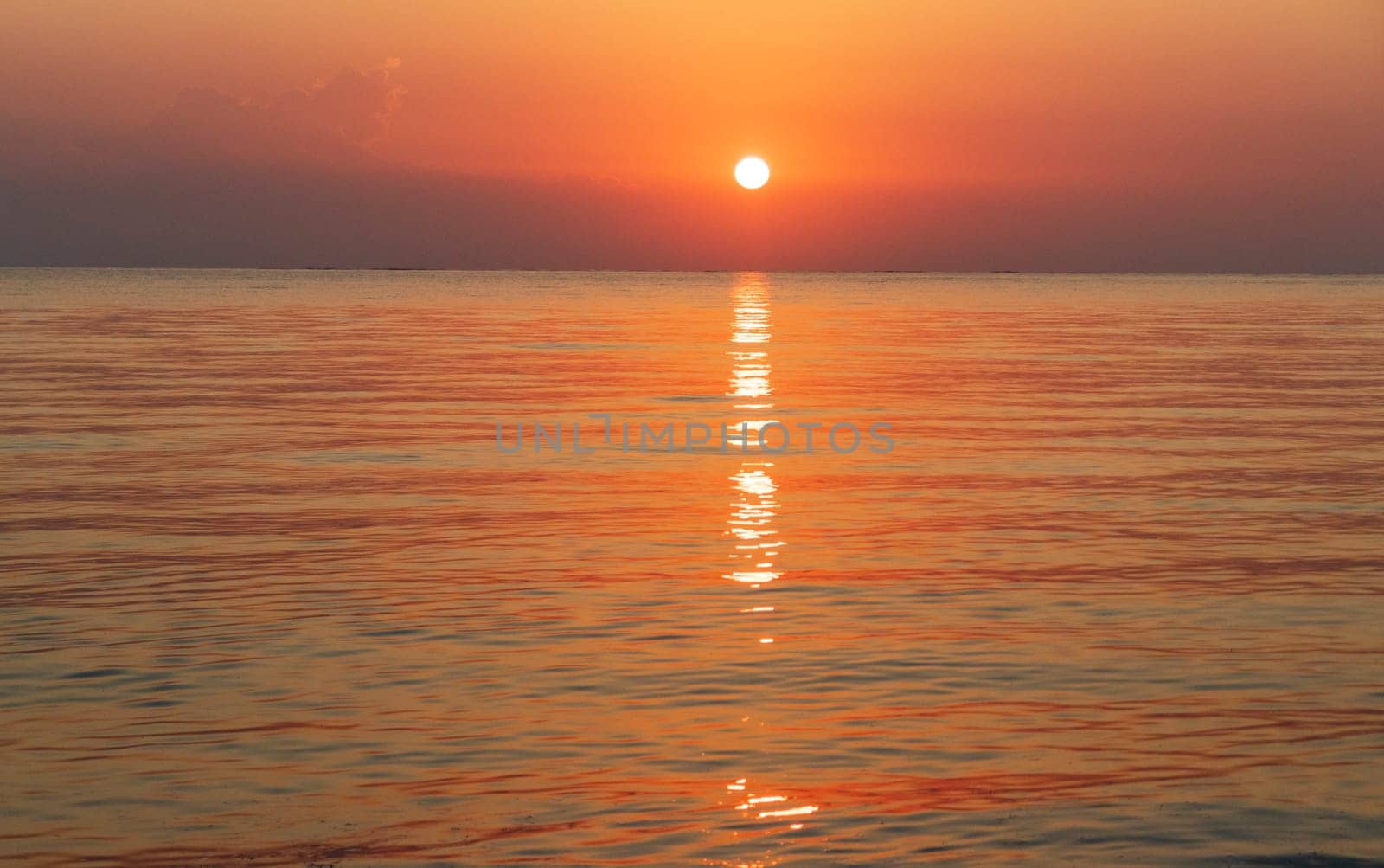 Shot of the dramatic sunrise by the sea.