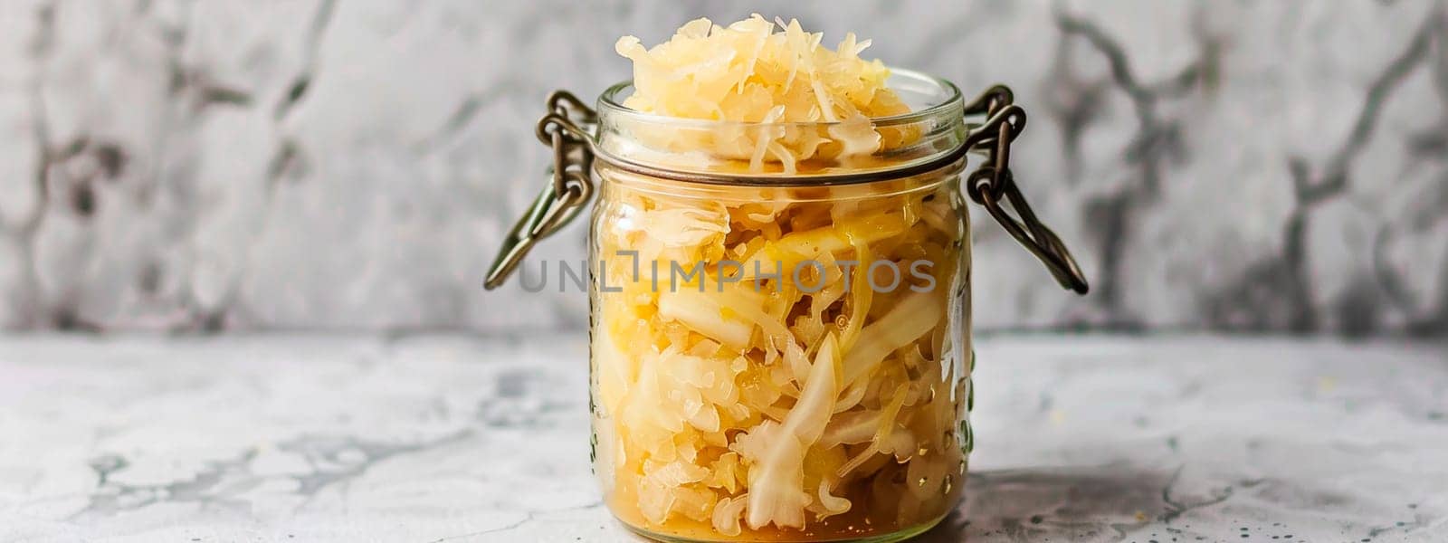 sauerkraut in a jar and spices. selective focus. by yanadjana