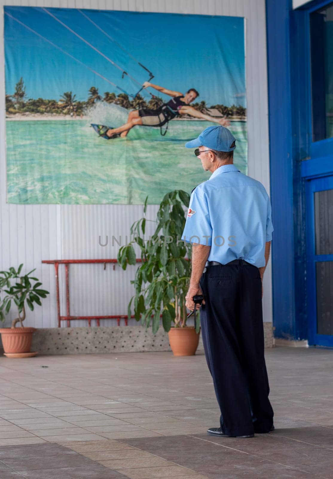 03.03.2024 - Cayo Coco Island, Cuba - Jardines del rey international airport. Senior security guard on duty