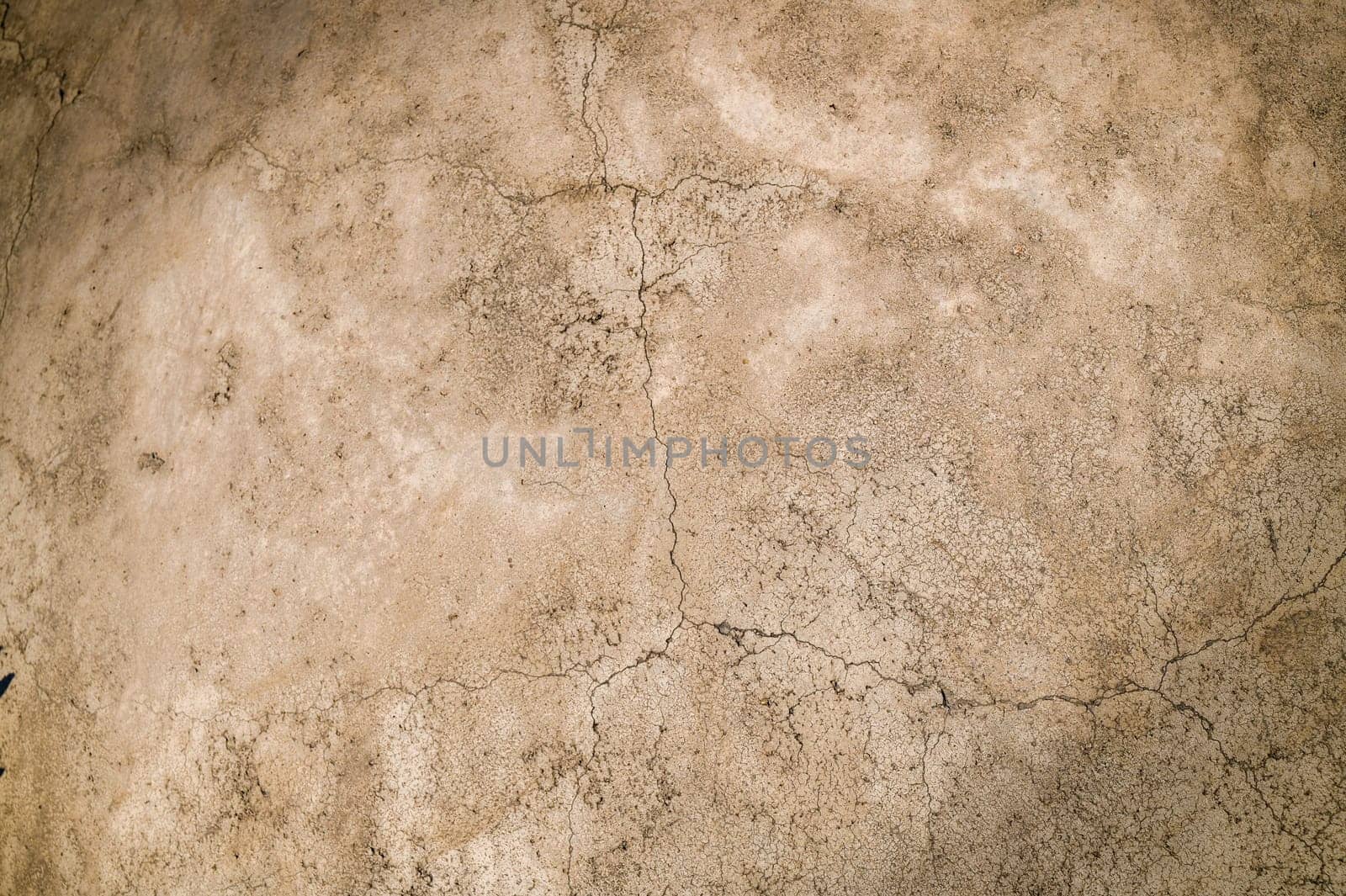 Texture of a brick wall with white shabby plaster, plaster. background, surface of a stone wall. Plastered wall with uneven plaster with cracks and damage. 1 by Mixa74