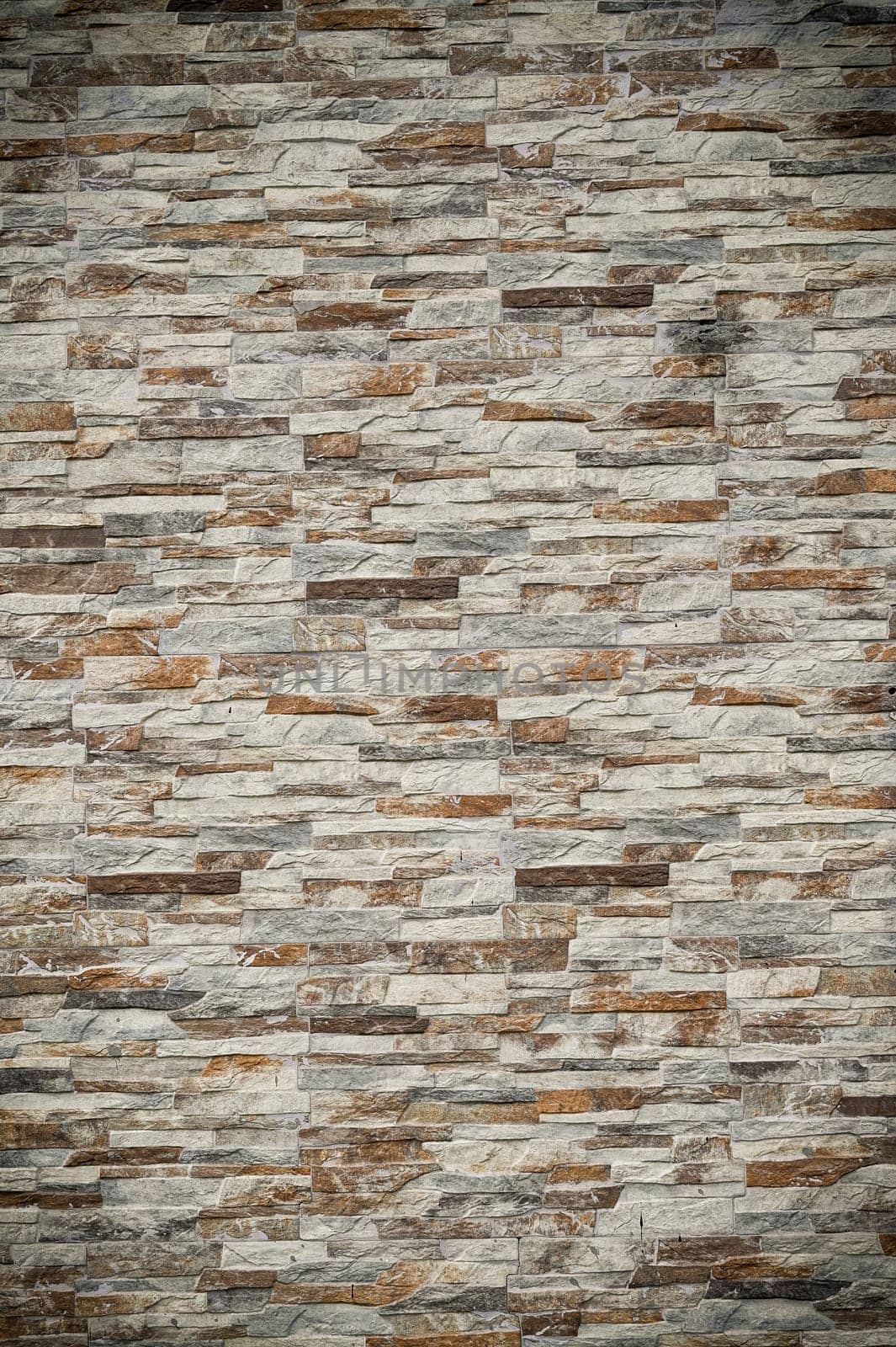 Abstract stone background. The texture of the stone wall. Close-up by Mixa74