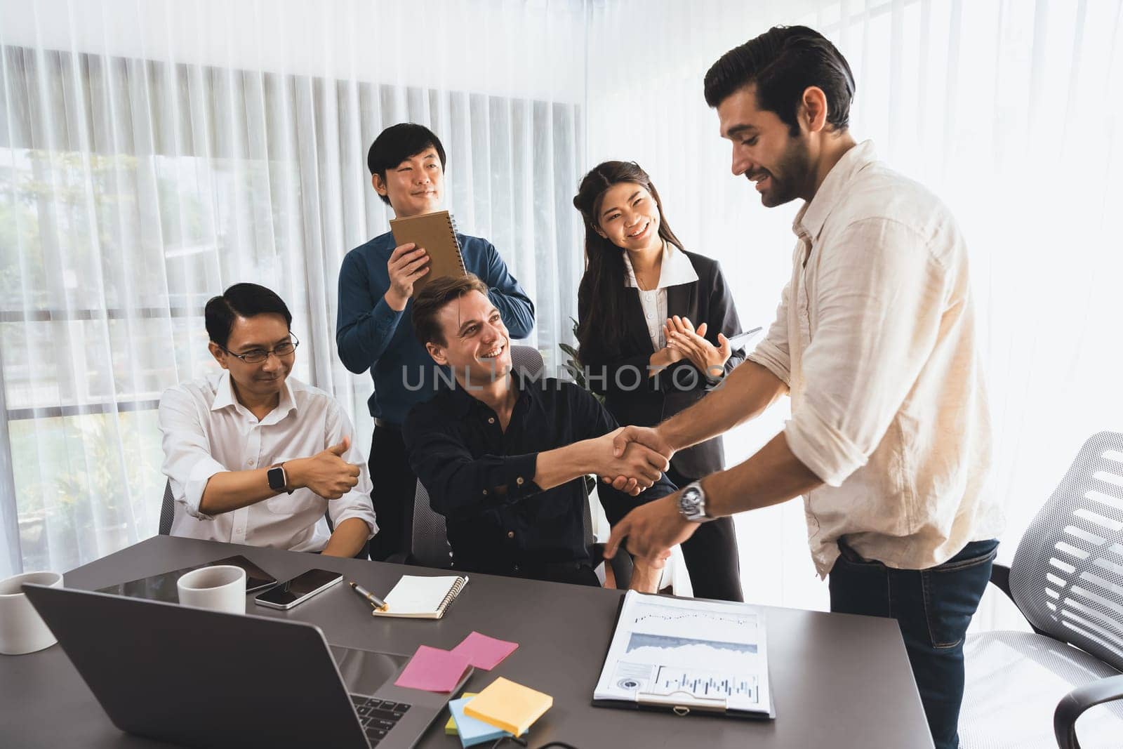 Group of diverse office worker employee shake hand and working together. Prudent by biancoblue