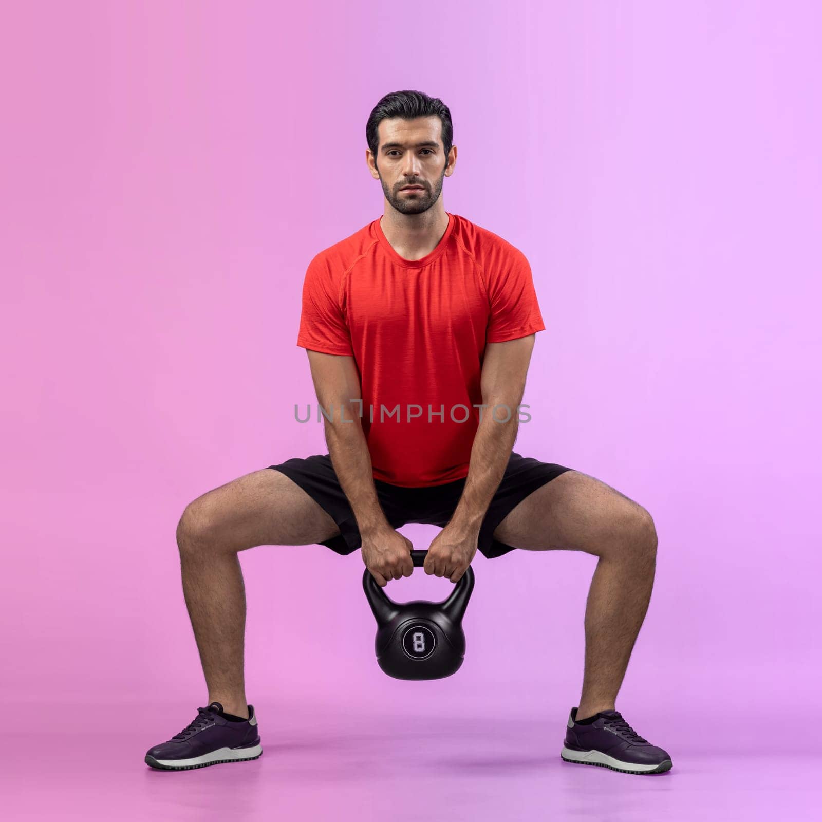 Full body length gaiety shot athletic and sporty young man with fitness in squat exercise posture on isolated background. Healthy active and body care lifestyle.