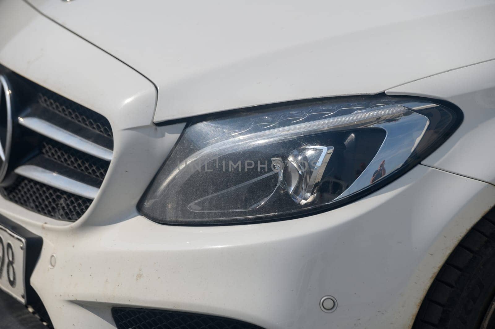 Gizelyurt Cyprus 02.08.2024 front fender and headlight fender of a Mercedes car