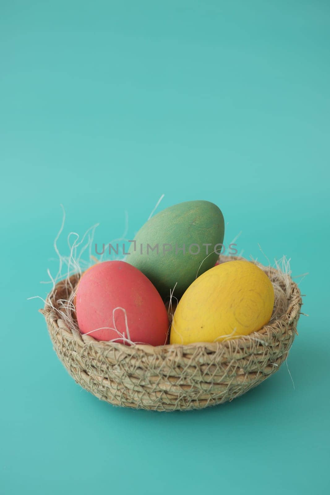 easter concept with multi color egg on pink background. by towfiq007