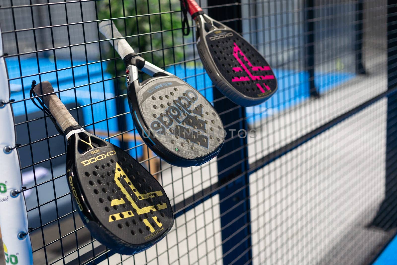Kyiv, Ukraine. March 22, 2024, Paddle tennis rackets on the court. High quality photo