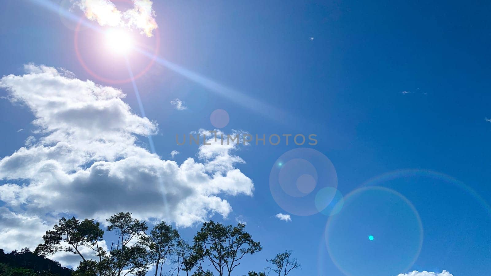 Blue sky with with shining light. Nature beauty concept.