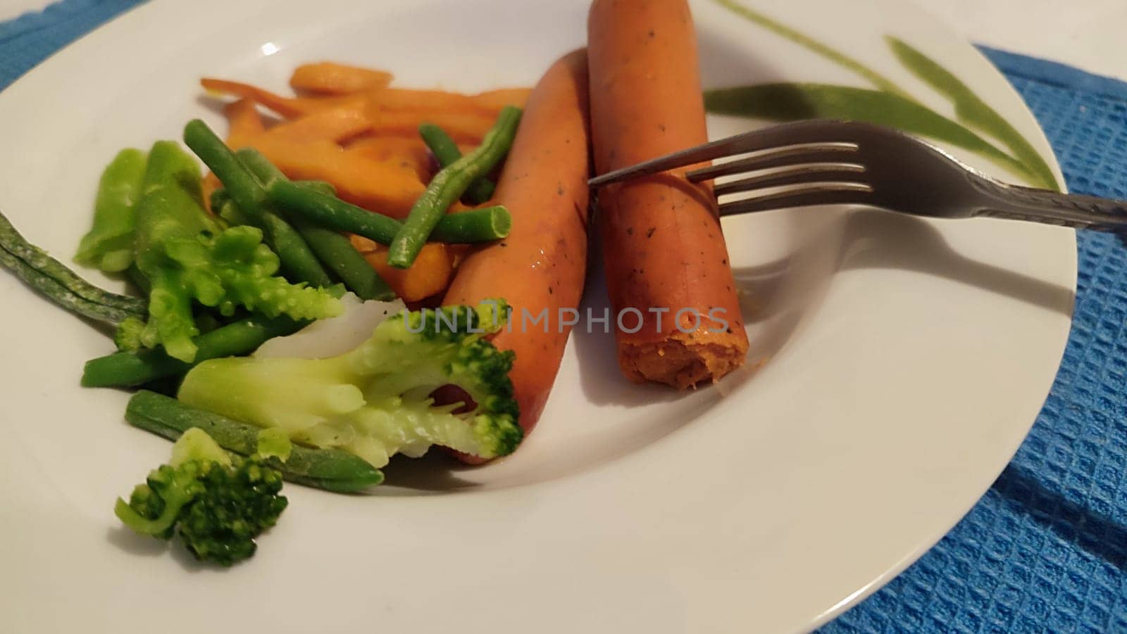 food sausages, sweet potatoes, broccoli. High quality photo