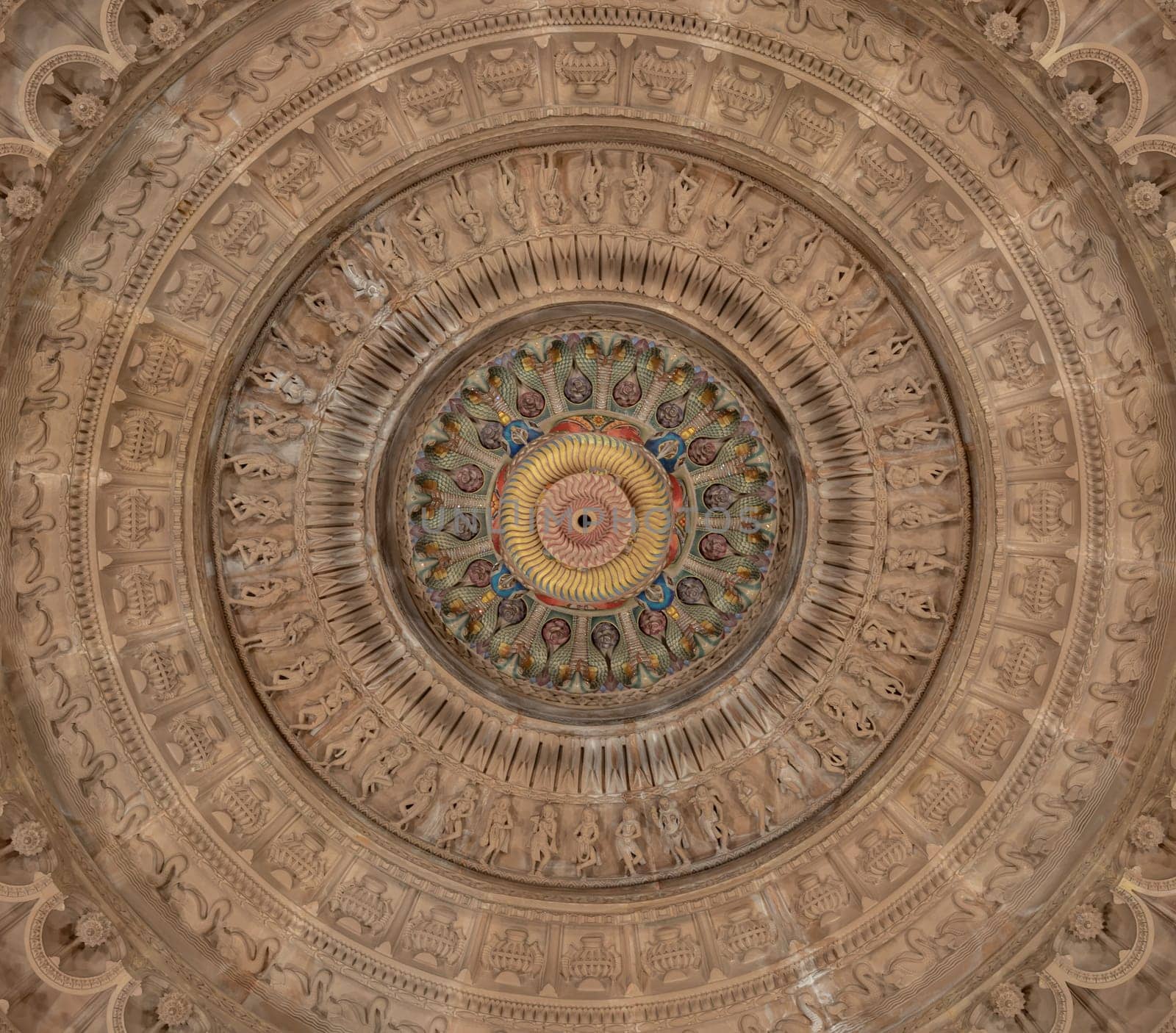 London, UK - Feb 27, 2024 - Elaborate ceiling design of intricately carved stone interior of The Shree Sanatan Hindu Mandir Hindu Temple. Look up, Copy space, Selective focus.