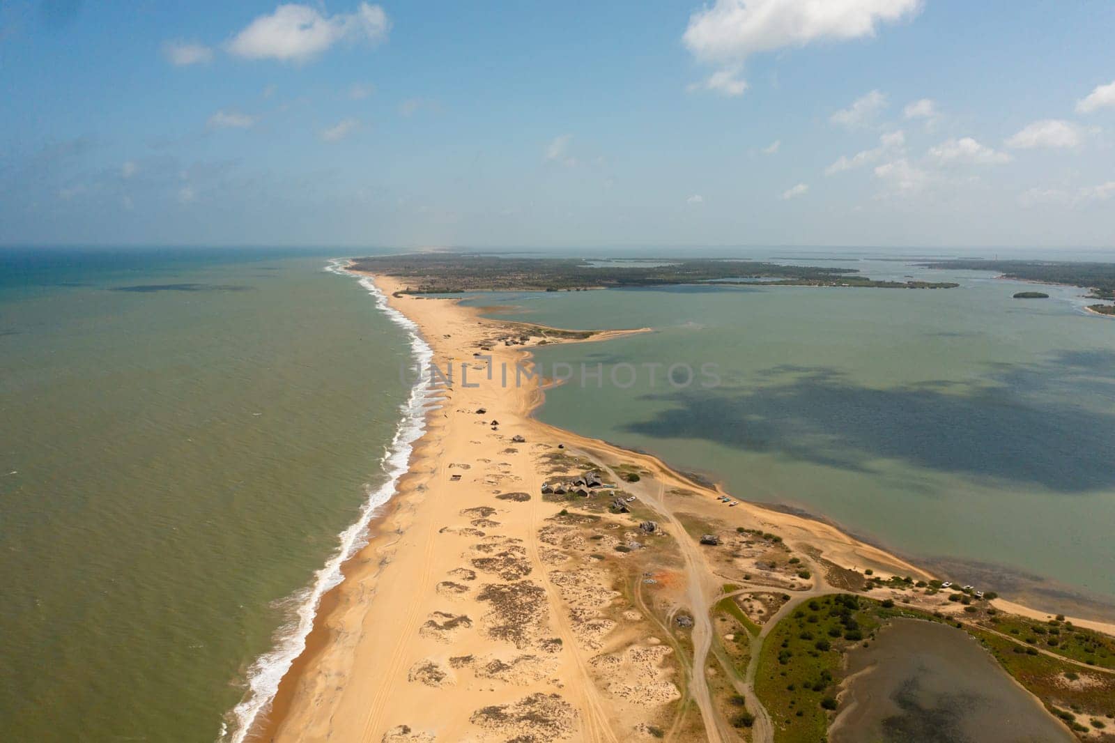 Tropical landscape with beautiful sandy beach and blue sea. Kalpitiya, Sri Lanka.