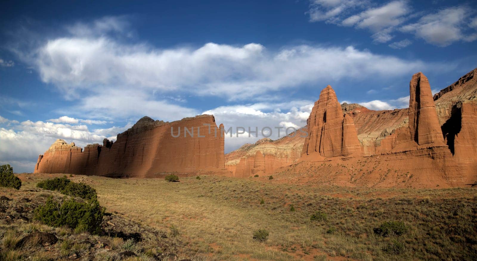 The light from a setting sun casts on Cathedral Valley at Capitol Reef National Park, Utah