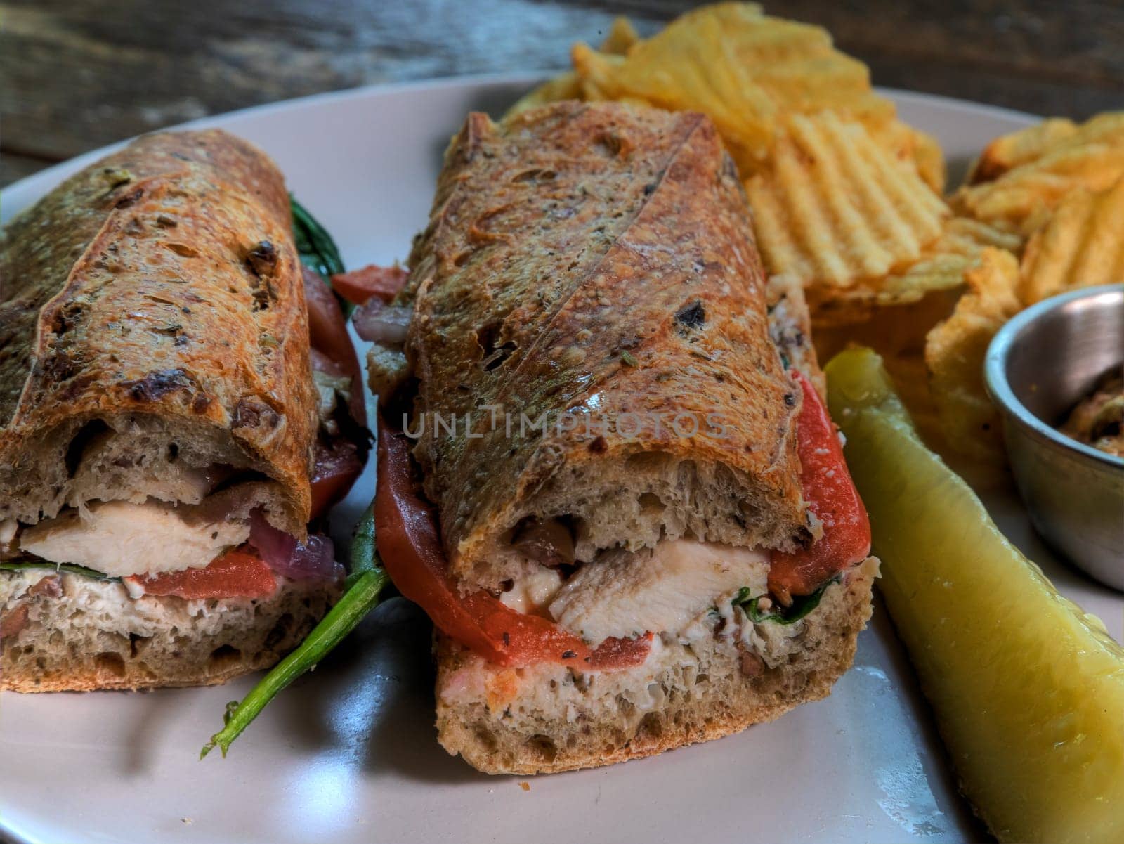 Side View of Chicken Pesto Baguette Sandwhich