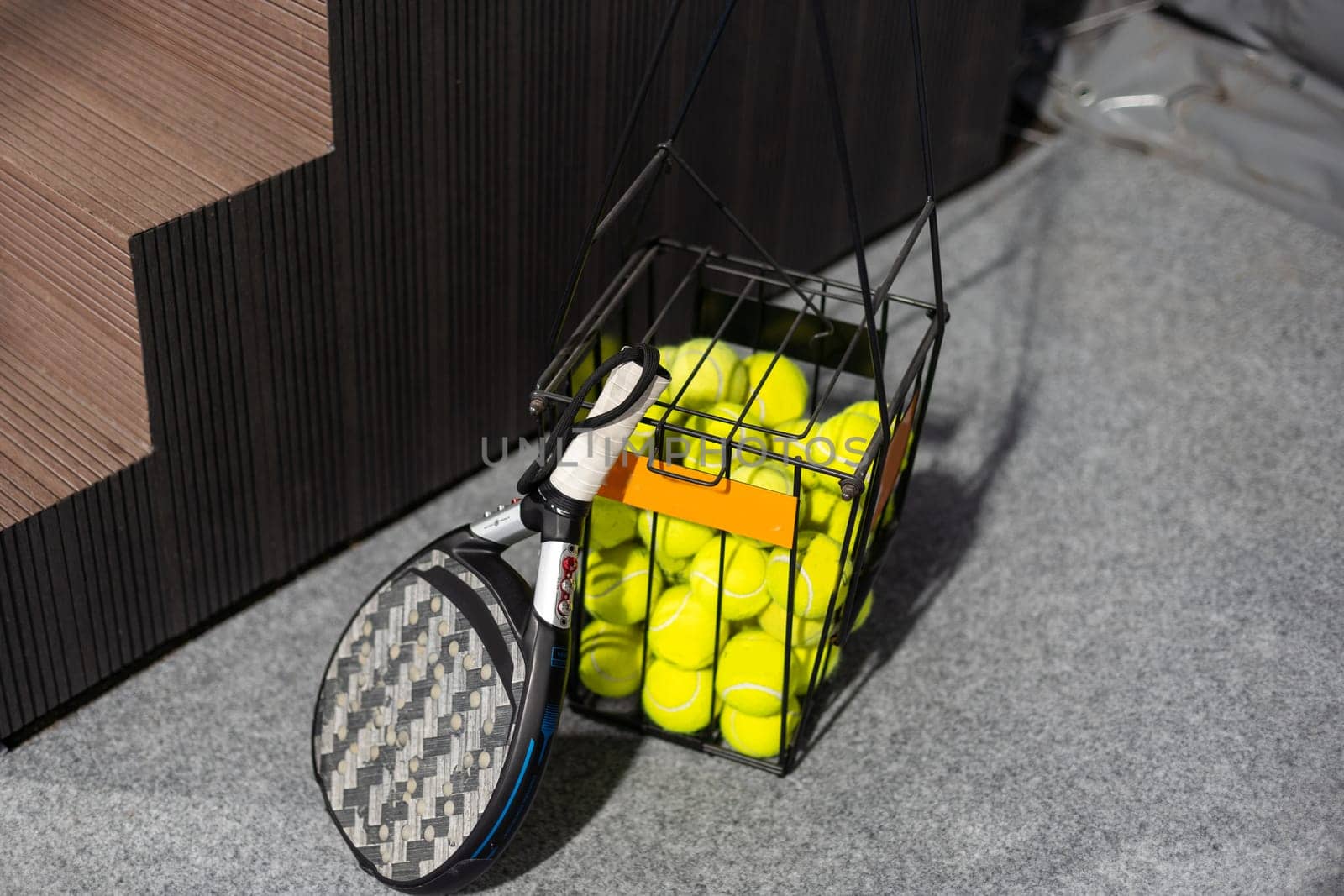 paddle tennis objects in court, racket and balls. High quality photo